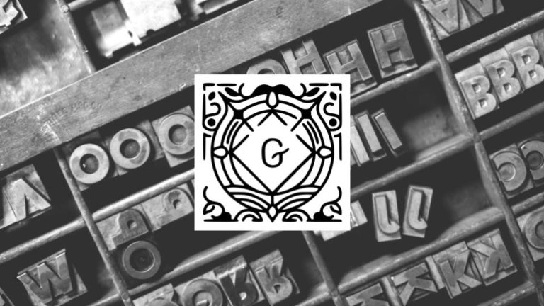 Caixa de tipos móveis em metal com logotipo do editor Gutenberg sobre